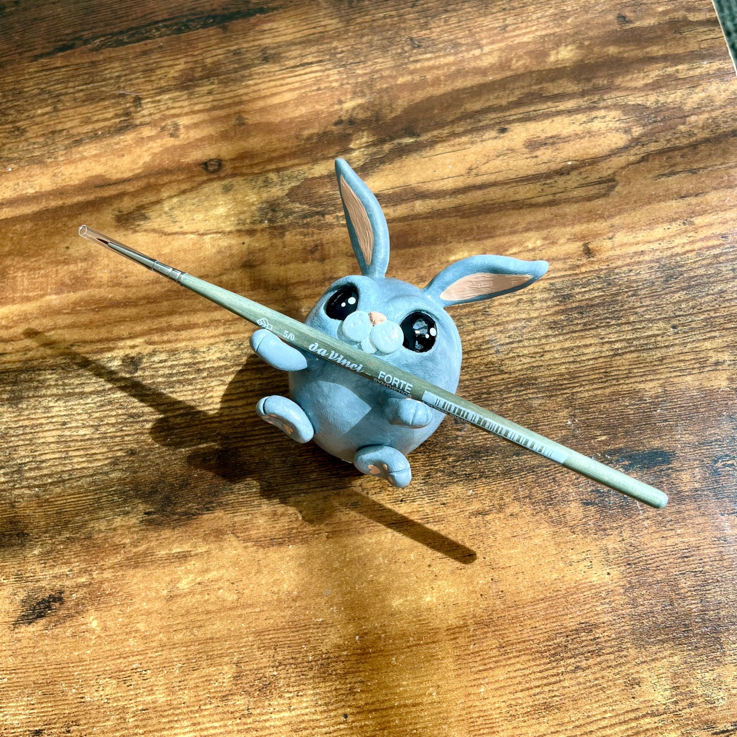 Figurine porte pinceau