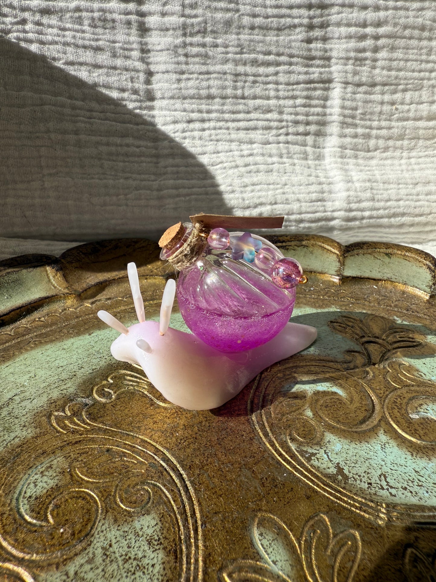 Figurine escargot potion