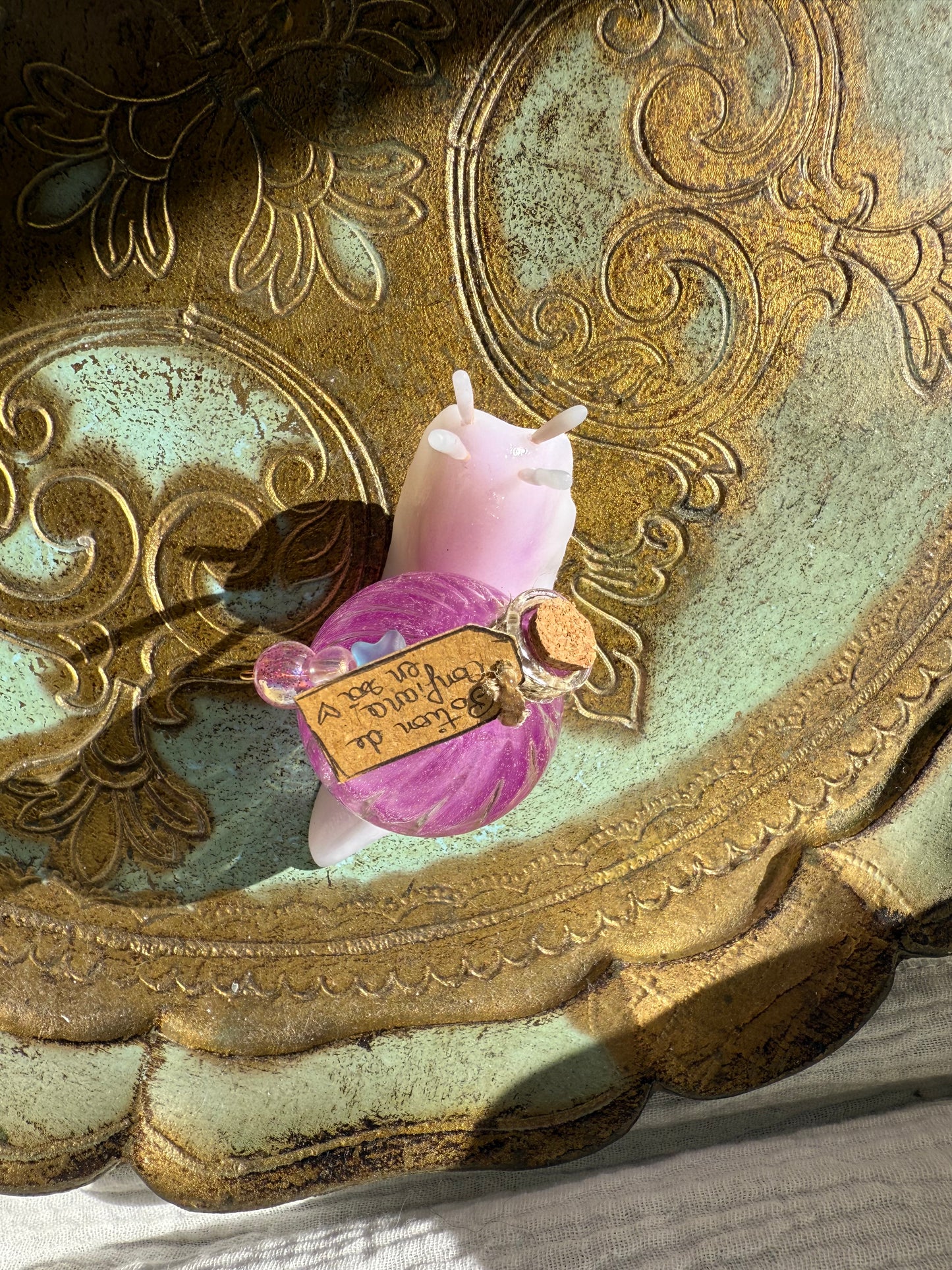 Figurine escargot potion